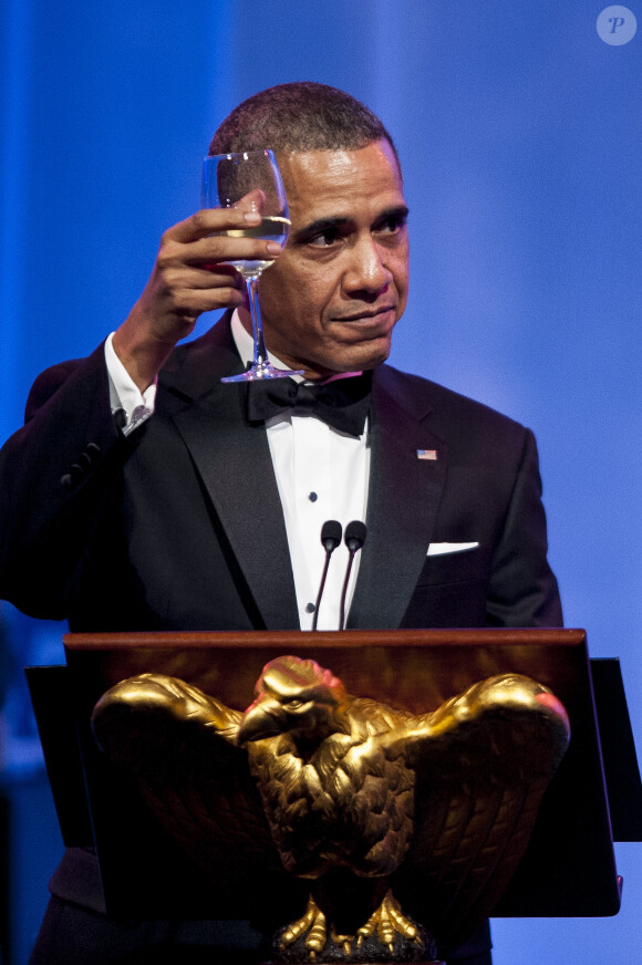 Barack Obama porte un toast lors du dîner d'Etat organisé à la Maison Blanche à Washington, le 11 février 2014.