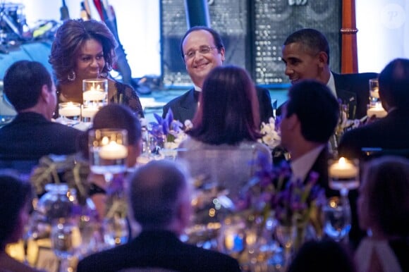 Michelle Obama, François Hollande et Barack Obama lors du dîner d'Etat organisé à la Maison Blanche à Washington, le 11 février 2014.