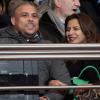 Le footballeur Ronaldo et sa compagne Paula Maurais assistent au match PSG-Valenciennes au Parc des Princes à Paris. Le 14 février 2014.