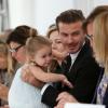 David Beckham et sa fille Harper assistent au défilé Victoria Beckham printemps-été 2014 à New York. Septembre 2013.