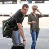 Julianne Hough et son nouveau petit ami Brooks Laich à l'aéroport de Los Angeles, le 18 février 2014.