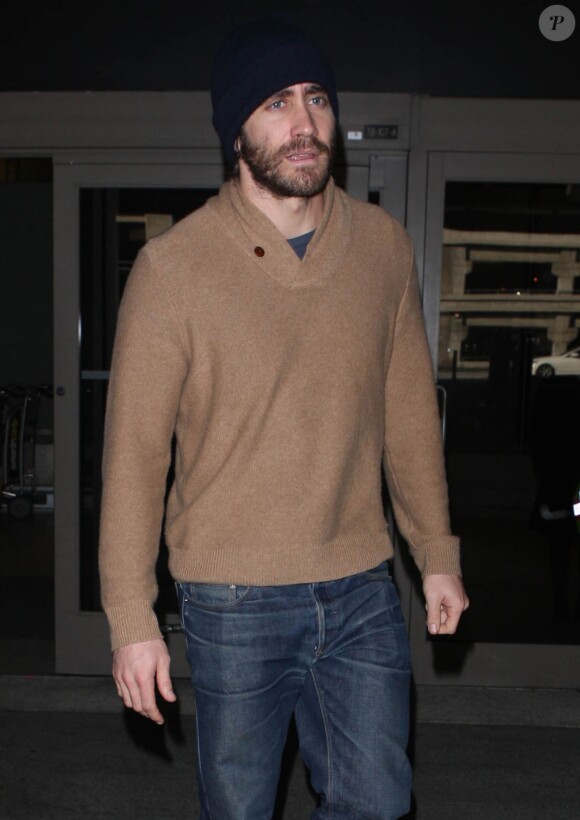 L'acteur Jake Gyllenhaal arrive à l’aéroport de LAX à Los Angeles, le 13 décembre 2013.
