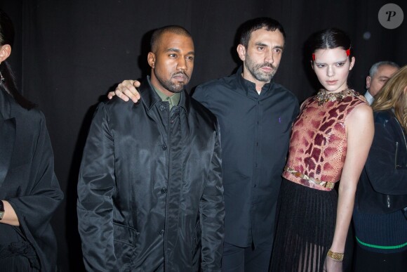 Kanye West, Riccardo Tisci et Kendall Jenner dans les coulisses du défilé Givenchy à la Halle Freyssinet. Paris le, 2 mars 2014.