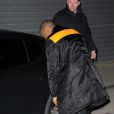 Kanye West arrive à la Halle Freyssinet pour assister au défilé Givenchy automne-hiver 2014-2015. Paris, le 2 mars 2014.