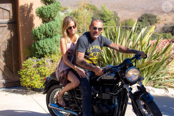 Christian Audigier et sa fiancée Nathalie Sorensen profitent de Los Angeles, le 26 août 2013 - Exclusif