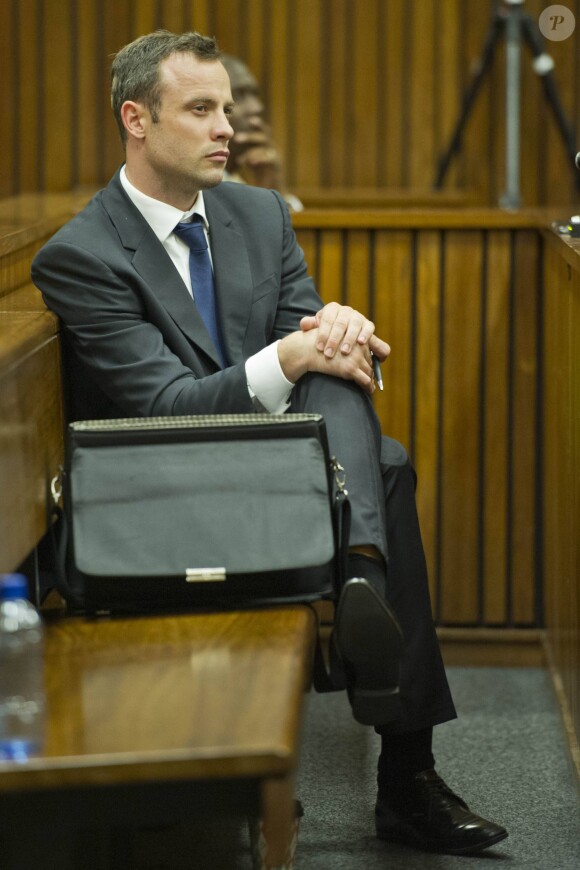 Oscar Pistorius lors de son procès devant la haute cour de justice de Pretoria, le 12 mars 2014