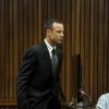 Oscar Pistorius lors de son procès au cours duquel il doit répondre du meurtre de Reeva Steenkamp, sa compagne, au tribunal de Pretoria, le 18 mars 2014