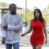 Kanye West et Kim Kardashian, divine dans une robe rouge Alexander McQueen et des sandales Sergio Rossi, se rendent au cinéma. Calabasas, le 14 mars 2014.