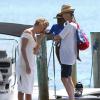 Charlize Theron est à Miami en Floride avec son fils Jackson (avec qui elle s'amuse follement) afin de réaliser une séance photo avec le célèbre photographe Mario Testino le 19 mars 2014.