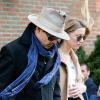 Johnny Depp et sa fiancée Amber Heard quittent leur hôtel main dans la main, à New York, le 22 mars 2014