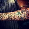 Justin Bieber dévoile ses derniers tatouages réalisés par Seunghyun Jo, le 25 mars 2014.