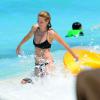 Heidi Klum et ses enfants Leni, Henry, Johan et Lou profitent à nouveau des joies de la plage sur Paradise Island aux Bahamas, le 23 mars 2014.