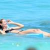 Heidi Klum et ses enfants Leni, Henry, Johan et Lou profitent à nouveau des joies de la plage sur Paradise Island aux Bahamas, le 23 mars 2014.