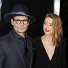 Johnny Depp et sa fiancée Amber Heard à Hollywood, le 12 février 2014.