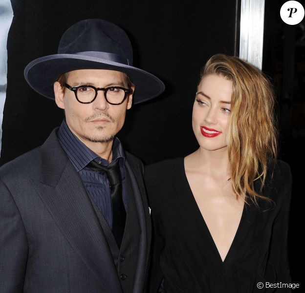 Johnny Depp et sa fianc&eacute;e Amber Heard &agrave; Hollywood, le 12 f&eacute;vrier 2014.