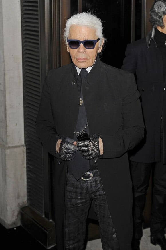 Karl Lagerfeld assiste à l'inauguration de sa boutique à Londres, le 13 mars 2014.