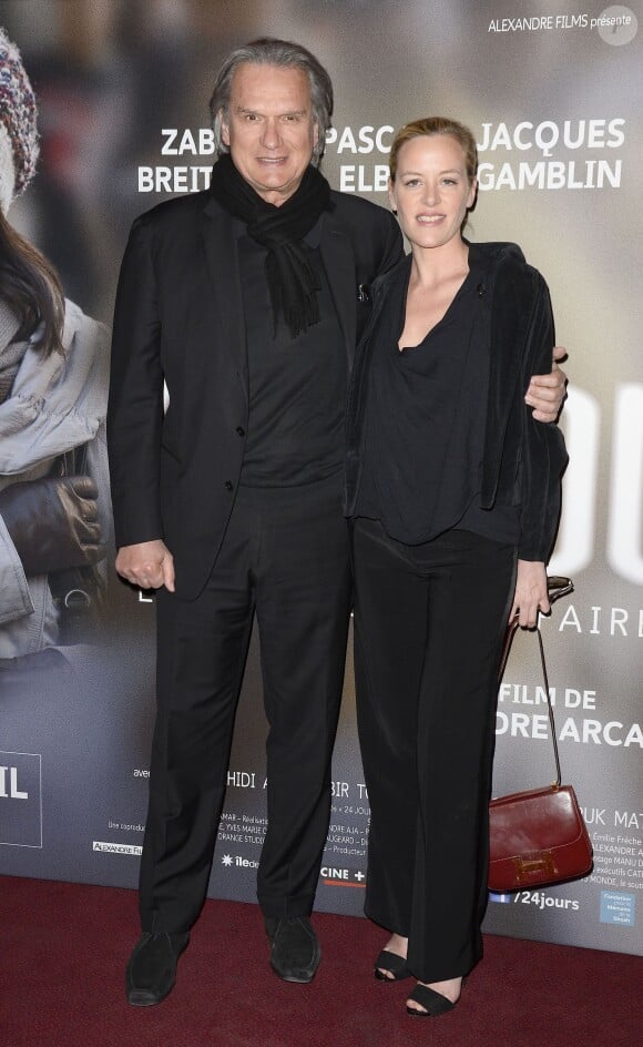 François-Eric Gendron et sa compagne Sandrine Gouin lors de l'avant-première du film "24 jours" au cinéma Gaumont Marignan à Paris, le 10 avril 2014