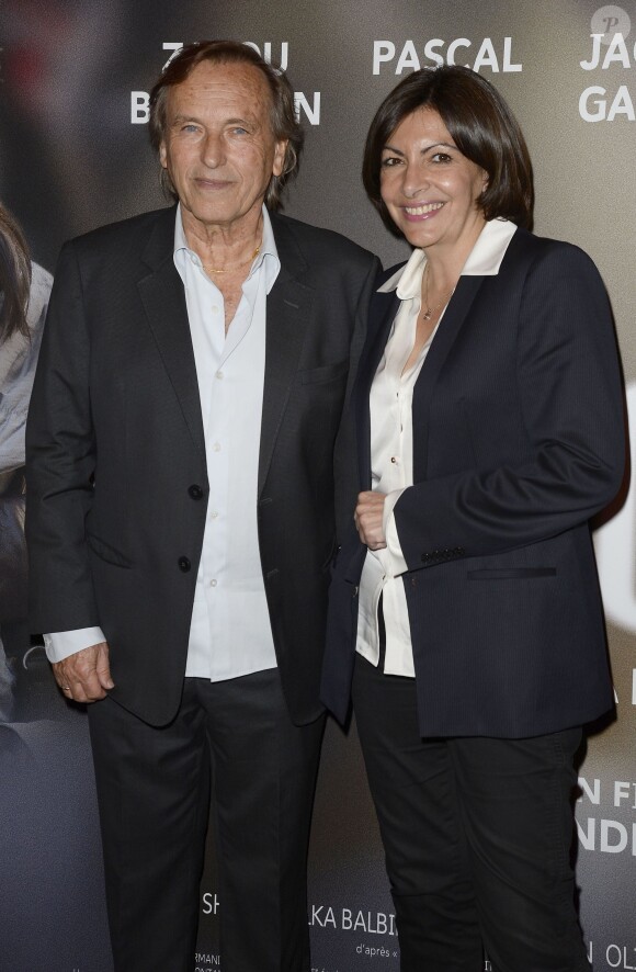 Alexandre Arcady et Anne Hidalgo lors de l'avant-première du film "24 jours" au cinéma Gaumont Marignan à Paris, le 10 avril 2014