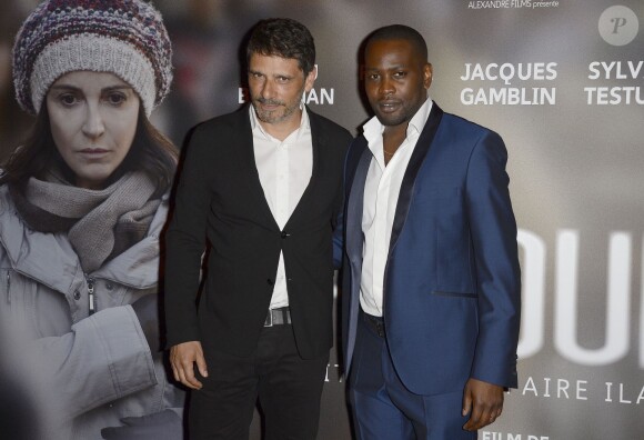 Pascal Elbé et Tony Harrisson lors de l'avant-première du film "24 jours" au cinéma Gaumont Marignan à Paris, le 10 avril 2014