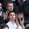 Michel Denisot et Zlatan Ibrahimovic accompagné de ses fils Maximilian et Vincent assistent au match de football PSG-Reims, au Parc des Princes à Paris le 5 avril 2014.