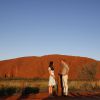 Kate Middleton et le prince William ont pris la pose devant l'inselberg Uluru (ou Ayers Rock), le 22 avril 2014, en Australie.