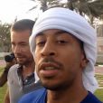 Ludacris à Abu Dhabi le 19 avril 2014, avec derrière lui Caleb Walker.