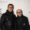 Stefano Gabbana (L) and Domenico Dolce arrivent à une soirée mode à Milan en févirer 2012