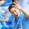 Samir Nasri et les joueurs de Manchester City fêtent le titre de champion d'Angleterre dans leur Etihad Stadium le 11 mai 2014.