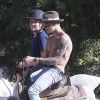 Justin Bieber fait du cheval à Los Angeles, le 12 mai 2014. Le jeune chanteur exhibe (pour la énième fois) ses tatouages.