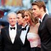 Sam Claflin, Jennifer Lawrence, Liam Hesmworth lors du 66e festival du film de Cannes, le 18 mai 2013.