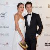 Pierre Niney et sa compagne Natasha Andrews lors de la soirée "Global Gift Gala" lors du 67ème festival international du film de Cannes, le 16 mai 2014.