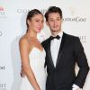 Pierre Niney et sa compagne Natasha Andrews lors de la soirée "Global Gift Gala" lors du 67ème festival international du film de Cannes, le 16 mai 2014.