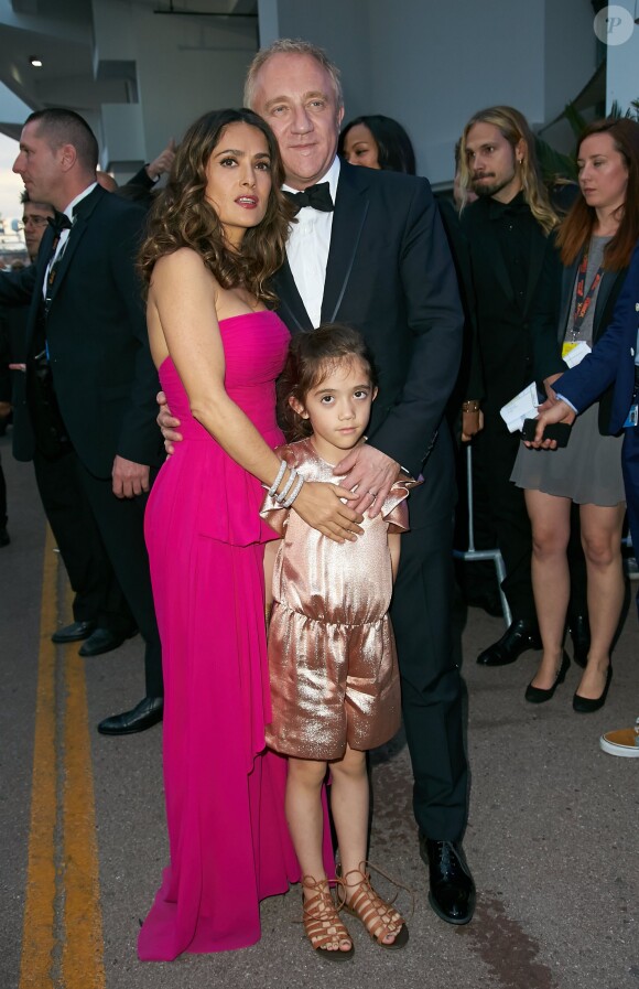 Salma Hayek, son mari François-Henri Pinault et leur fille Valentina Pinault lors de l'hommage au cinéma d'animation lors du 67e Festival du film de Cannes le 17 mai 2014.