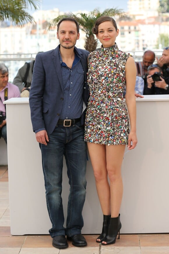 Fabrizio Rongione et Marion Cotillard - Photocall du film "Deux jours, une nuit" lors du 67e Festival international du film de Cannes, le 20 mai 2014.
