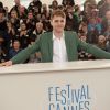 Le réalisateur Xavier Dolan lors du photocall du film Mommy au Festival de Cannes le 22 mai 2014