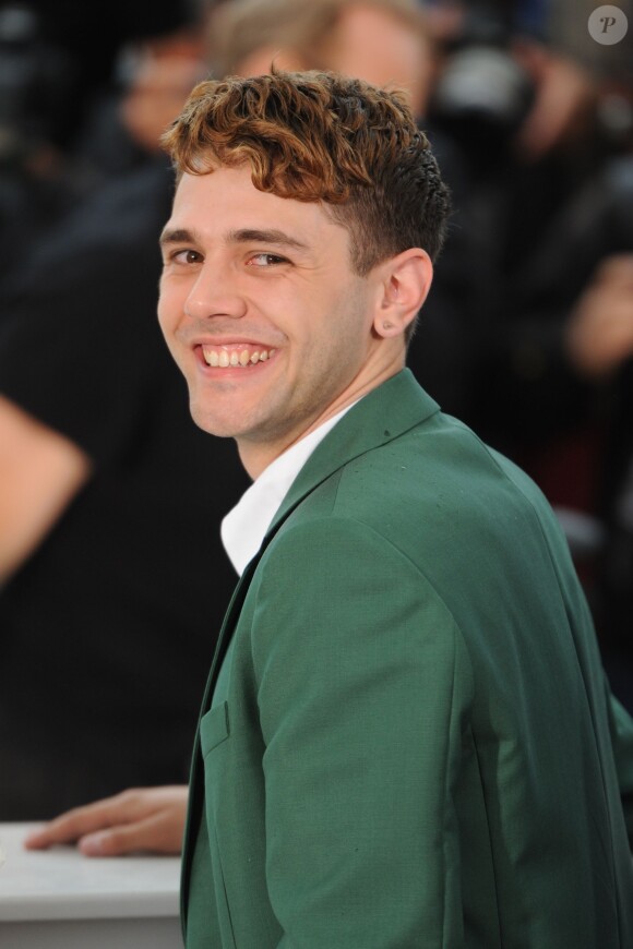 Le réalisateur Xavier Dolan lors du photocall du film Mommy au Festival de Cannes le 22 mai 2014