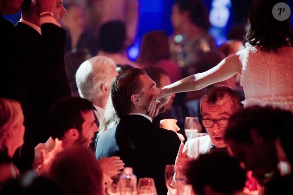 Leonardo DiCaprio et Marion Cotillard - 21e gala de l'amfAR à l'Eden Roc au Cap d'Antibes en marge du 67e Festival du film de Cannes, le 22 mai 2014