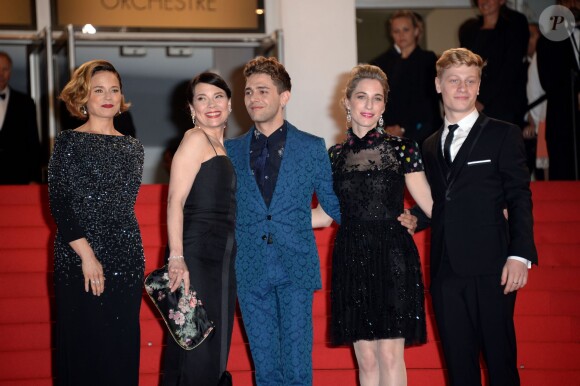 Xavier Dolan, Anne Dorval, Antoine Olivier Pilon, Suzanne Clément à la montée des marches pour le film "Mommy" lors du 67e Festival de Cannes, le 22 mai 2014.