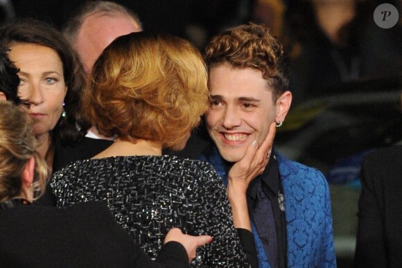 Suzanne Clément et Xavier Dolan à la montée des marches pour le film "Mommy" lors du 67e Festival de Cannes, le 22 mai 2014.