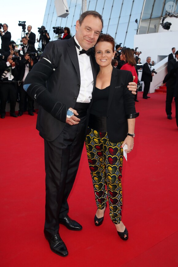 Xavier Couture et Emmanuelle Gaume à la montée des marches du film "Sils Maria" lors du 67e Festival du film de Cannes le 23 mai 2014.