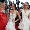 Marion Dumas, Karine Lima et Eleonore Boccara, toutes les trois habillées par Christophe Guillarmé, à la montée des marches du film "Sils Maria" lors du 67e Festival du film de Cannes le 23 mai 2014.