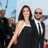 Helena Noguerra et Fabrice Du Welz à la montée des marches du film "Sils Maria" lors du 67e Festival du film de Cannes le 23 mai 2014.