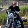 Johnny Hallyday fait un tour de moto avant d'aller déjeuner au restaurant à Malibu, le 25 mai 2014.