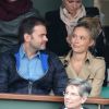 Clovis Cornillac et sa femme Lilou Fogli assistent aux Internationaux de France de tennis de Roland Garros à Paris, le 27 mai 2014.