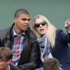 Daniel Narcisse et sa compagne Emmanuellle - People aux Internationaux de France de tennis de Roland Garros à Paris, le 27 mai 2014.