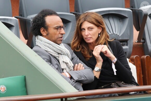 Manu Katché et sa compagne Laurence - People aux Internationaux de France de tennis de Roland Garros à Paris, le 27 mai 2014, pendant le match de Gaël Monfils. .