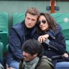 Rebecca Fitoussi et son compagnon aux Internationaux de France de tennis de Roland Garros à Paris, le 27 mai 2014.
