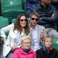  Zo&eacute; F&eacute;lix et son compagnon Benjamin Rolland lors du match entre Jo-Wilfried Tsonga et J&uuml;rgen Melzer &agrave; Roland-Garros &agrave; Paris, le 28 mai 2014.&nbsp; 