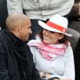 Le footballeur Aurélien Capoue et sa femme Rachel Legrain-Trapani lors du match entre Jo-Wilfried Tsonga et Jürgen Melzer à Roland-Garros à Paris, le 28 mai 2014.  