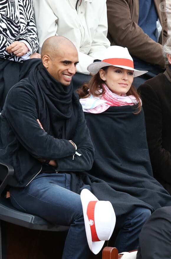 Aurélien Capoue et sa femme Rachel Legrain-Trapani lors du match entre Jo-Wilfried Tsonga et Jürgen Melzer à Roland-Garros à Paris, le 28 mai 2014. 